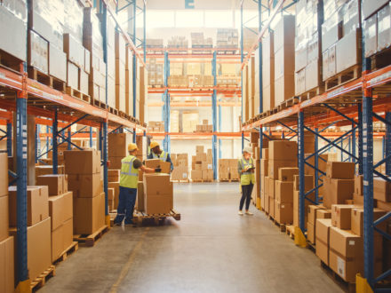 Logistics center with three staff members